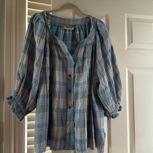Never worn madras plaid we the free blouse. Beautiful shades of blue, size large